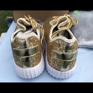 Remy 18k gold shoes.Never worn Excellent condition